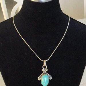 Woman’s Elegant Sliver and Turquoise Pendant Necklace